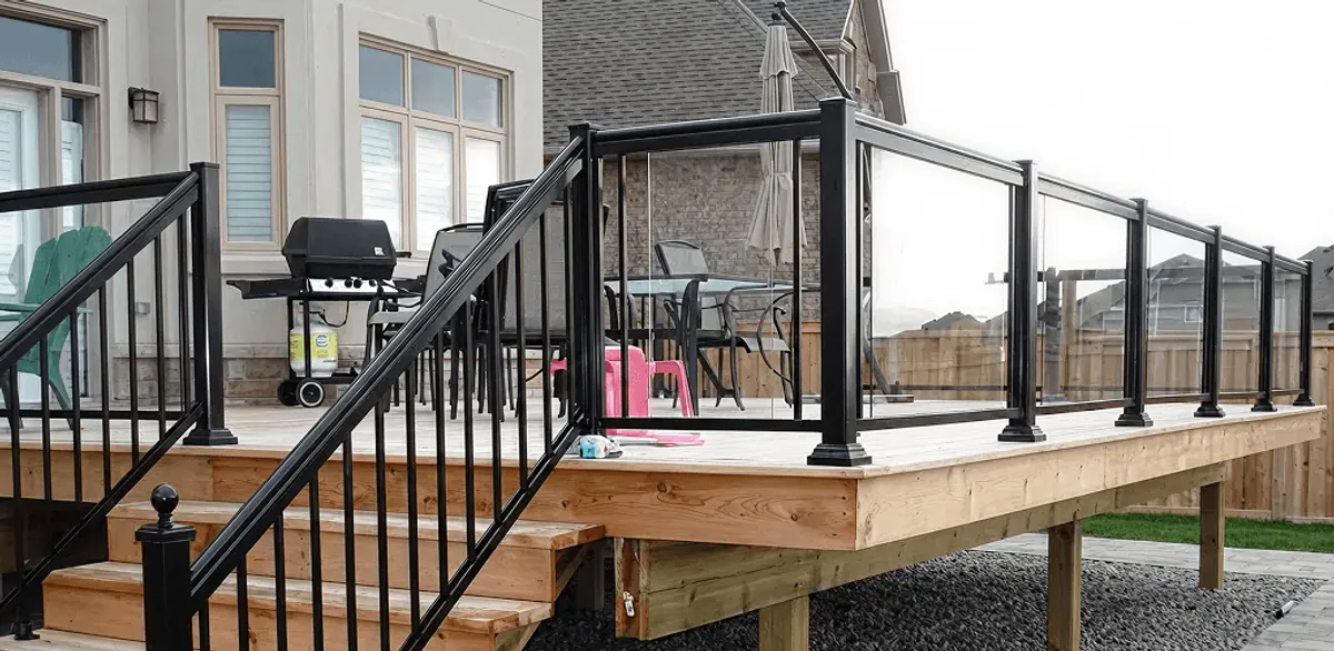 Handrail installation on a deck staircase for safety and code compliance in Jackson, MS