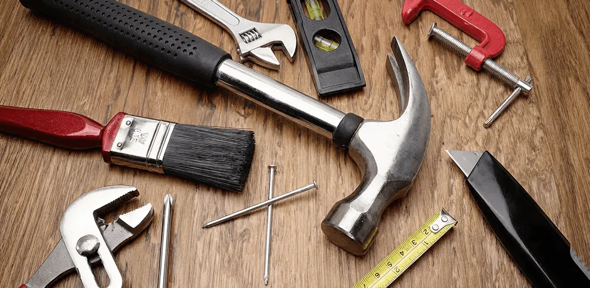 Handyman tools laid out for home repair and maintenance work in Jackson, MS